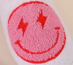 Smiley Face Slippers with Lightning Bolt Eyes